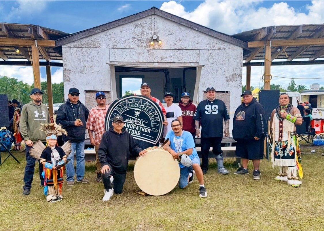 Grandfather Stone drum group at a Pow Wow gathering
